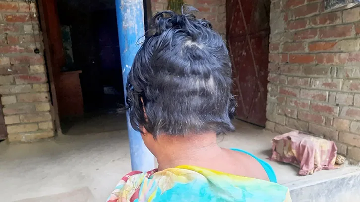 পরকীয়ার অপবাদে নারীকে মারধর, চুল কেটে শরীরে মরিচের গুঁড়া